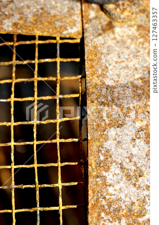 Abstract close up of rusty mesh wire for background Abstract close up of rusty mesh wire for background 127463357