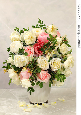 Beautiful still life with cream tea rose and rose hip flowers on elegant modern table,Abstract flower arrangement. template for your design , minimalist beauty concept, beautiful flower card Beautiful still life with cream tea rose and rose hip flowers on elegant modern table,Abstract flower arrangement. template for your design , minimalist beauty concept, beautiful flower card 127463560