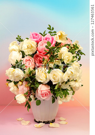 Abstract flower arrangement.Beautiful still life with cream tea rose and rose hip flowers on elegant modern table,template for your design,minimalist beauty concept,nice flower card Abstract flower arrangement.Beautiful still life with cream tea rose and rose hip flowers on elegant modern table,template for your design,minimalist beauty concept,nice flower card 127463561