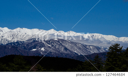 Blue skies and snow in the Northern Alps, Hakuba Village, Nagano Prefecture Blue skies and snow in the Northern Alps, Hakuba Village, Nagano Prefecture 127464684