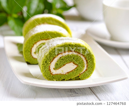 Swiss roll on a plate 127464768