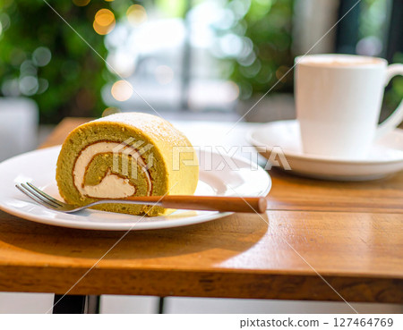 Swiss roll on a plate 127464769