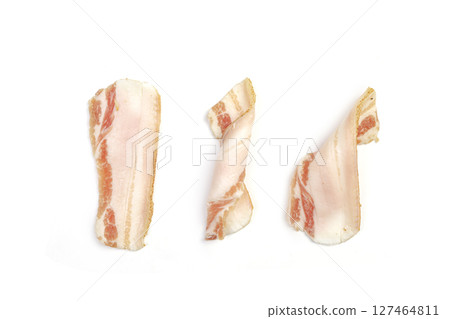 Slice of bacon or fatback isolated on white background 127464811