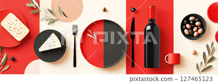 Stylish table setting featuring black and red plates, wine bottle, cheese, olives, and cutlery, creating a vibrant dining atmosphere with modern design elements Stylish table setting featuring black and red plates, wine bottle, cheese, olives, and cutlery, creating a vibrant dining atmosphere with modern design elements 127465123
