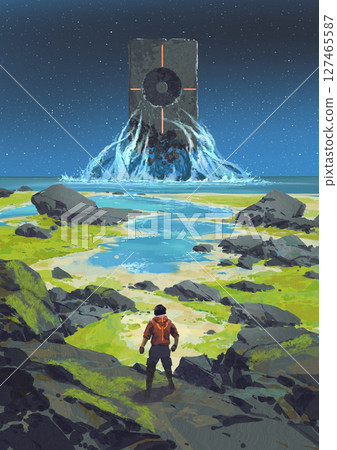 Man Observes Mysterious Monolith Emerging from Ocean Shoreline at Night 127465587