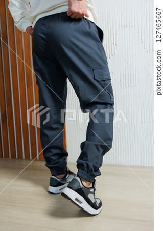 Men's casual sports pants with pockets. Lightweight summer pants for men. Men's casual sports pants with pockets. Lightweight summer pants for men. 127465667