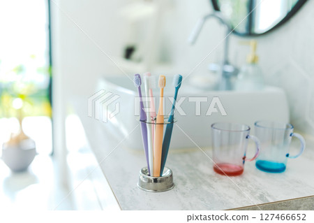 Toothbrushes in a stylish bathroom Toothbrushes in a stylish bathroom 127466652