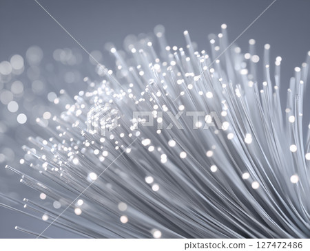 Futuristic optical cable glowing on dark background, information technology illustration 127472486
