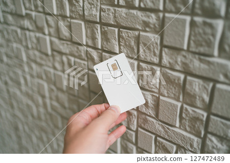 SIM and IoT SIM and IoT 127472489