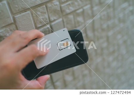 SIM, IoT, and smartphones SIM, IoT, and smartphones 127472494