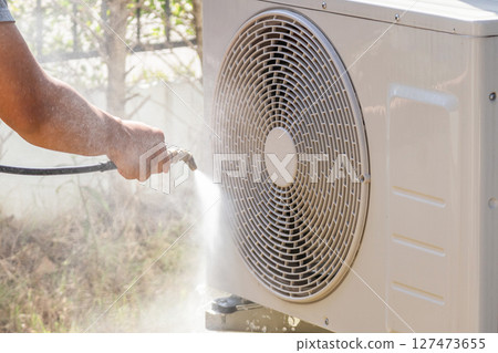 air conditioning compressor outdoor unit cleaning service with water spray air conditioning compressor outdoor unit cleaning service with water spray 127473655