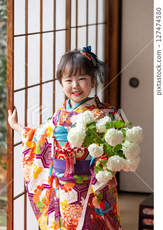 Cute girl in kimono for Shichigosan 7 years old Cute girl in kimono for Shichigosan 7 years old 127474580