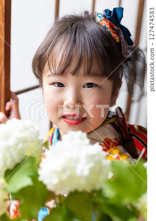 Cute girl in kimono for Shichigosan 7 years old 127474583