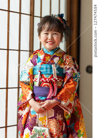 Cute girl in kimono for Shichigosan 7 years old 127474584