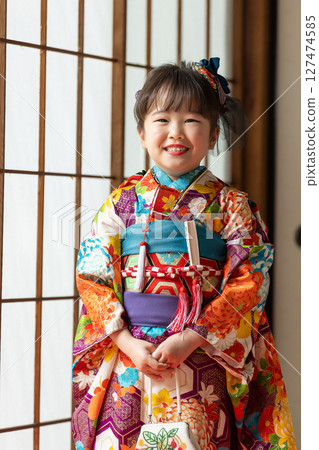 Cute girl in kimono for Shichigosan 7 years old 127474585