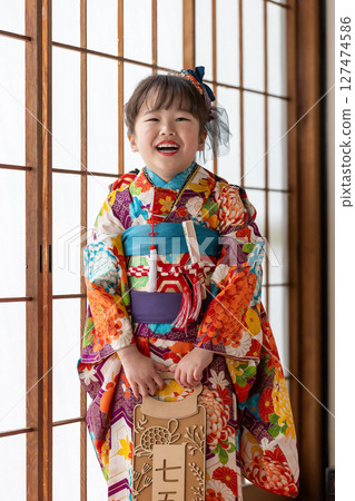 Cute girl in kimono for Shichigosan 7 years old 127474586
