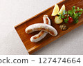 Grilled raw sausages 127474664