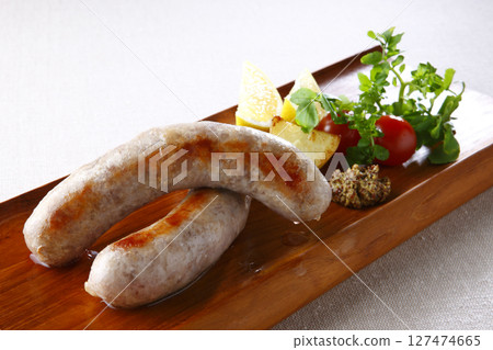 Grilled raw sausages 127474665
