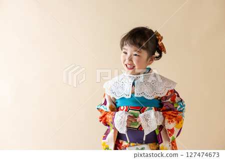 Cute girl in kimono for Shichigosan 7 years old 127474673
