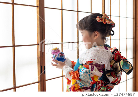 Cute girl in kimono for Shichigosan 7 years old Cute girl in kimono for Shichigosan 7 years old 127474697