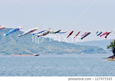 Carp streamers swimming at sea Carp streamers swimming at sea 127475585