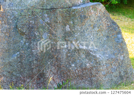 Rune stone in Sweden from the viking ages, about a thousand years old 127475604