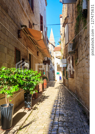 Beautiful narrow street in old town of Trogir, Croatia Beautiful narrow street in old town of Trogir, Croatia 127475631