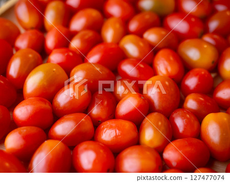 Organic Red grape cherry tomato. fresh vegetables. copy space. Organic Red grape cherry tomato. fresh vegetables. copy space. 127477074