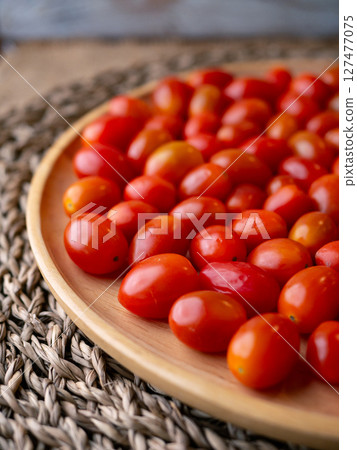 Organic Red grape cherry tomato. fresh vegetables. copy space. Organic Red grape cherry tomato. fresh vegetables. copy space. 127477075
