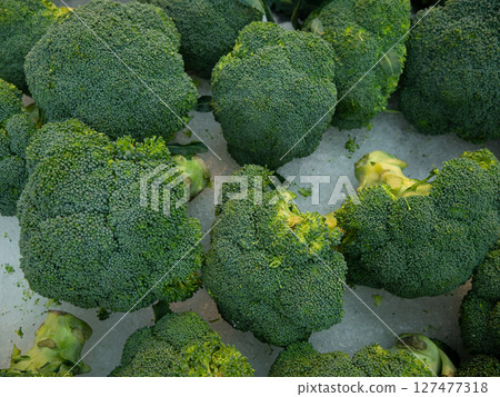 Fresh organic Broccoli on supermarket shelf. Fresh organic Broccoli on supermarket shelf. 127477318