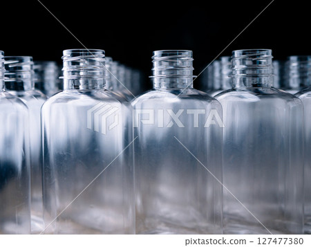 Row of plastic PET Bottles Production Line Ready for Bottling. Row of plastic PET Bottles Production Line Ready for Bottling. 127477380