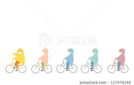 圖：一男一女身穿雨衣，騎著色彩繽紛的自行車 127478248