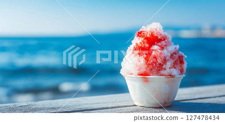 Shaved ice eaten on the terrace of a cafe with a view of the sea AI image Shaved ice eaten on the terrace of a cafe with a view of the sea AI image 127478434