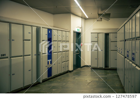 Luggage lockers at train station terminal for secure baggage storage and passenger convenience Luggage lockers at train station terminal for secure baggage storage and passenger convenience 127478597