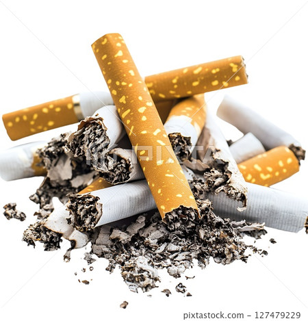 A pile of extinguished cigarettes and ash rests on a white background 127479229