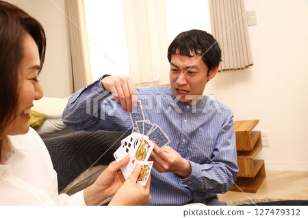 Couple playing cards 127479312