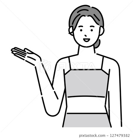 A woman wearing yoga wear giving instructions 127479382