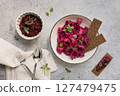 Vibrant Beetroot Salad, Perfectly Paired with Crunchy Crackers and Fresh Herbs 127479475