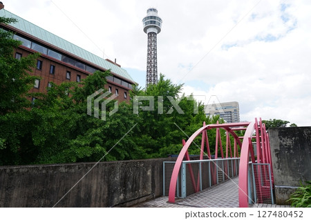 Yamashita Park Marine Tower and red pedestrian bridge 127480452