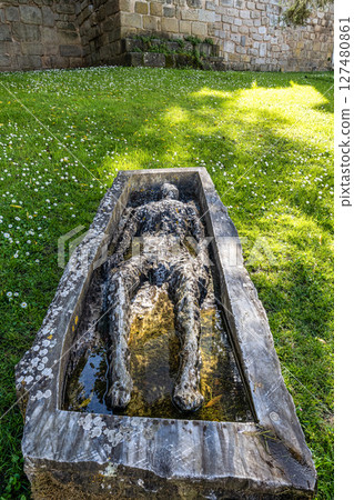 A coffin art at the Jardim dos Colegiais in the old Town of Evora, Alentejo in Portugal. A coffin art at the Jardim dos Colegiais in the old Town of Evora, Alentejo in Portugal. 127480861