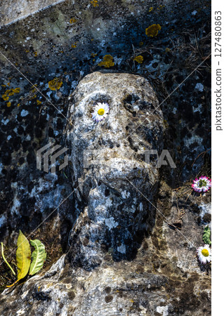 A coffin art at the Jardim dos Colegiais in the old Town of Evora, Alentejo in Portugal. 127480863