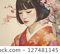 Scene of a woman in traditional Japanese clothing smiling among cherry blossoms in spring 127481145