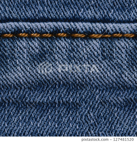Seamless Denim fabric with yellow thread seams, denim jacket, denim pants, for background or fabric sample sale. Seamless Denim fabric with yellow thread seams, denim jacket, denim pants, for background or fabric sample sale. 127481520