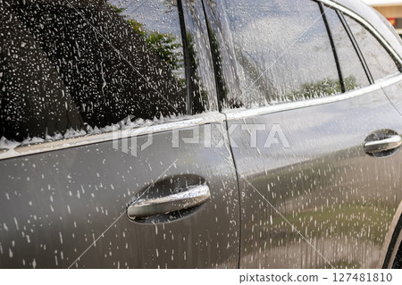 car cleaning and washing with foam soap 127481810