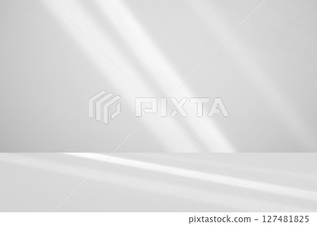 Abstract white studio room with light and shadow from window background for product display presentation 127481825