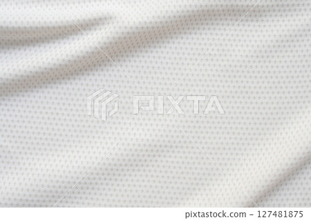 White sports clothing fabric football shirt jersey texture abstract background White sports clothing fabric football shirt jersey texture abstract background 127481875