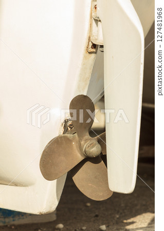 Close up of white boat propeller Close up of white boat propeller 127481968