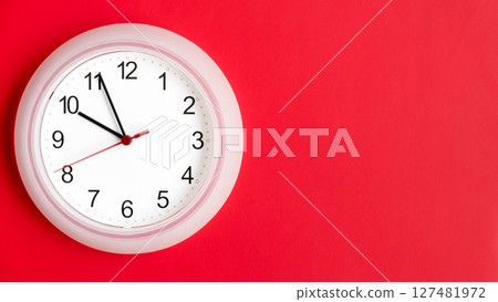 clock on wall showing ten hours 127481972