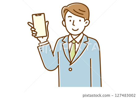 A young businessman in a suit holding a smartphone and looking at the camera A young businessman in a suit holding a smartphone and looking at the camera 127483002