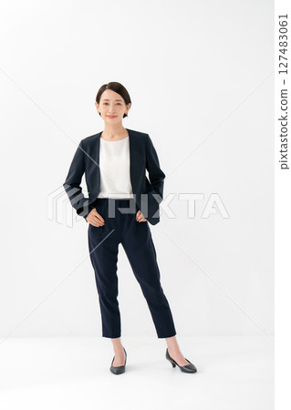 Woman in suit, full body Woman in suit, full body 127483061